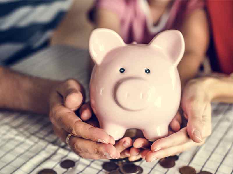 Piggy bank saving money for braces